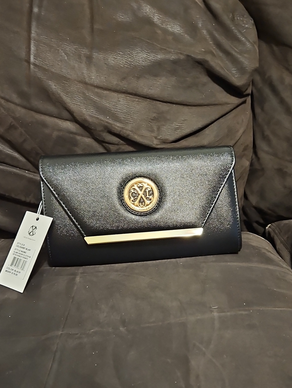 Christian Lacroix Black Clutch with Gold Medallion and Bar Accent